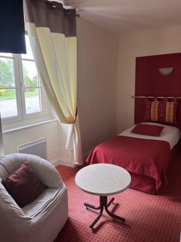 Logis Hotel De La Tour Masseret Bagian luar foto