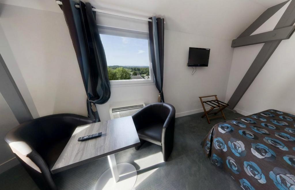 Logis Hotel De La Tour Masseret Ruang foto